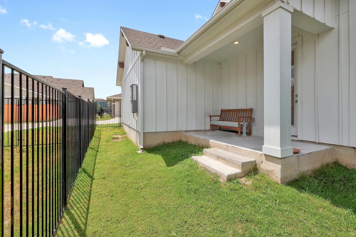 8312 Corrigan Pass Austin, TX 78744 - Photo 25 of 27 a view of backyard with a garden and stairs