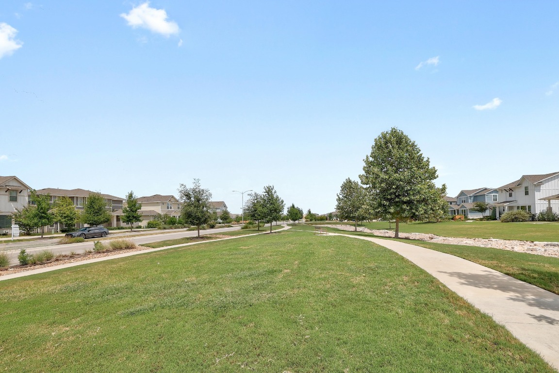 8312 Corrigan Pass Austin, TX 78744 - Photo 27 of 27 a view of a swimming pool and an outdoor space