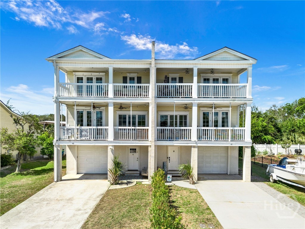 40 Captains View Tybee Island, GA 31328 - Photo 2 of 64 Day view of front of house
