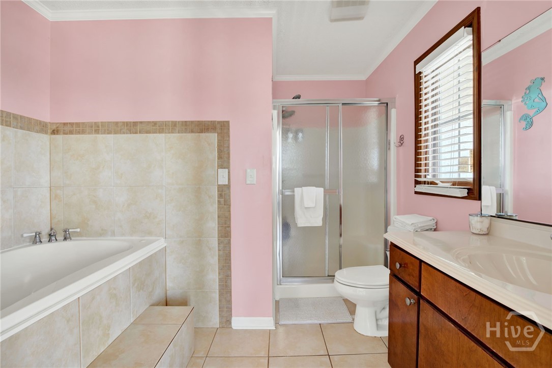 40 Captains View Tybee Island, GA 31328 - Photo 39 of 64 Master bathroom with jacuzzi tub and shower