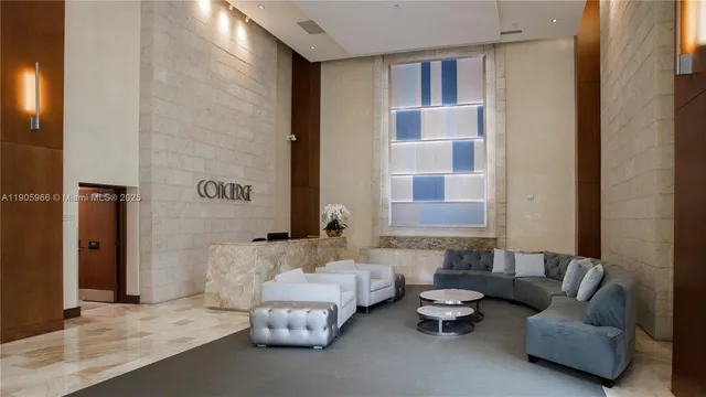 a living room with furniture and a bathtub