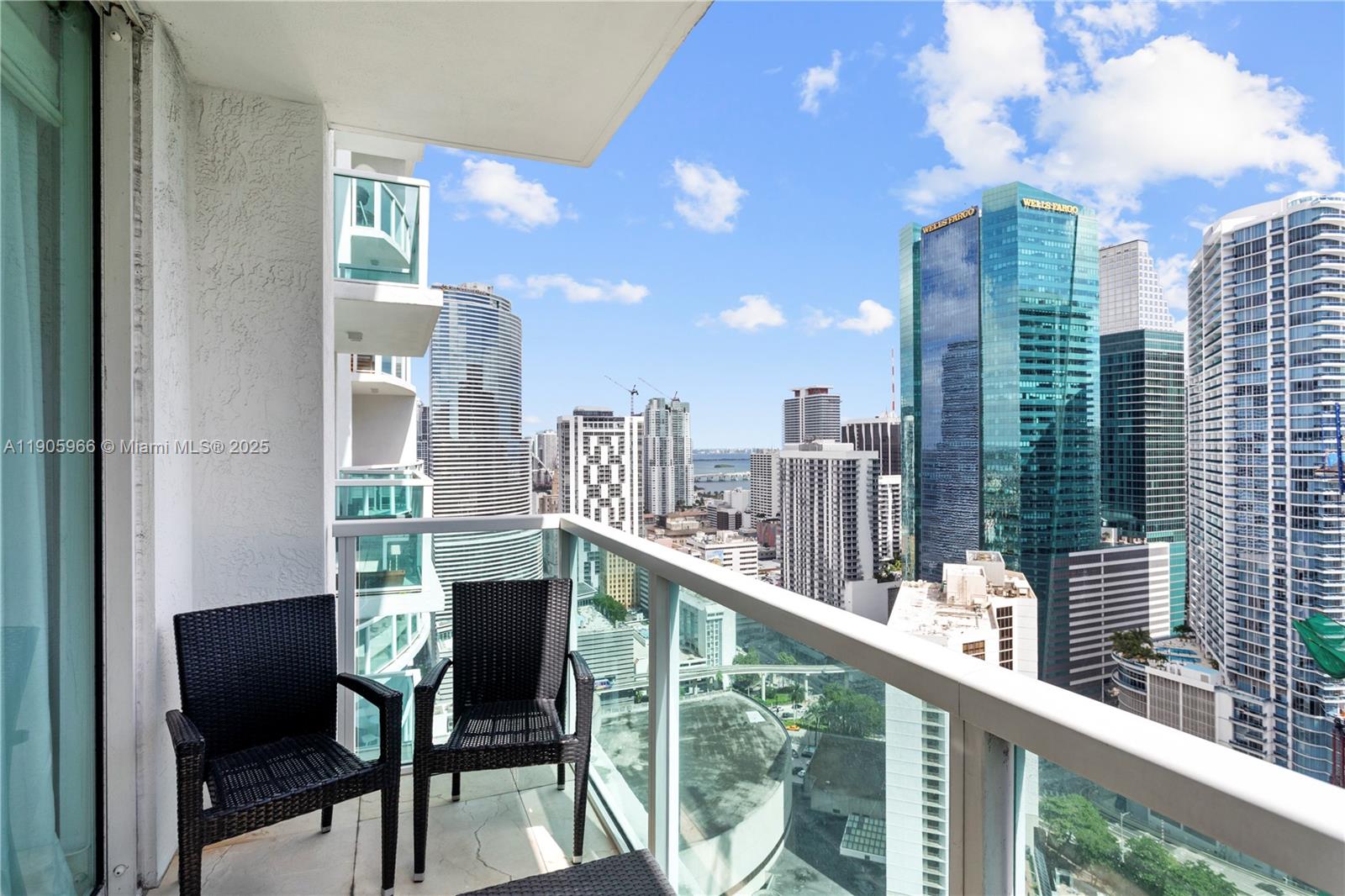 31 Southeast 5th Street, Unit 4018 Miami, FL 33131 - Photo 2 of 23 a city view from a balcony with outdoor seating