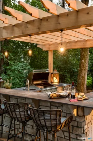 a view of an outdoor sitting area with fire pit
