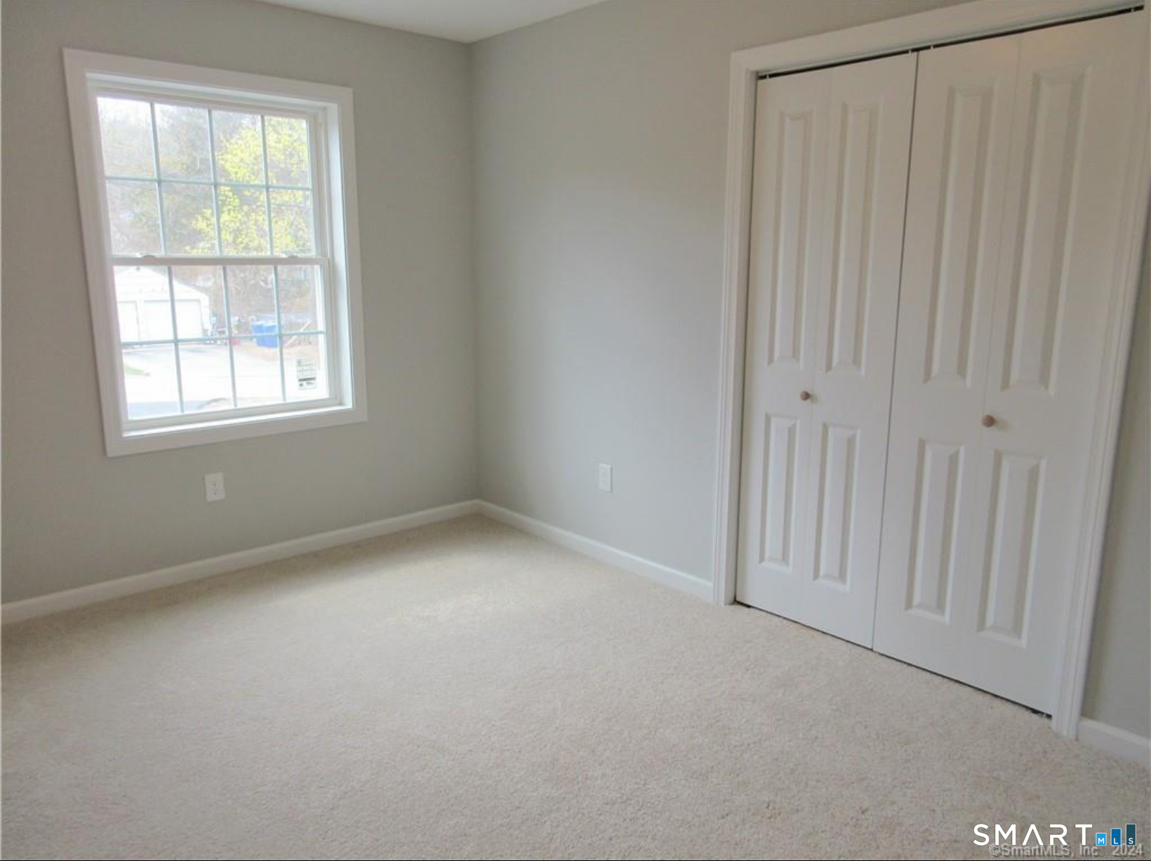 249 South Canterbury Road Canterbury, CT 06331 - Photo 11 of 20 an empty room with a window