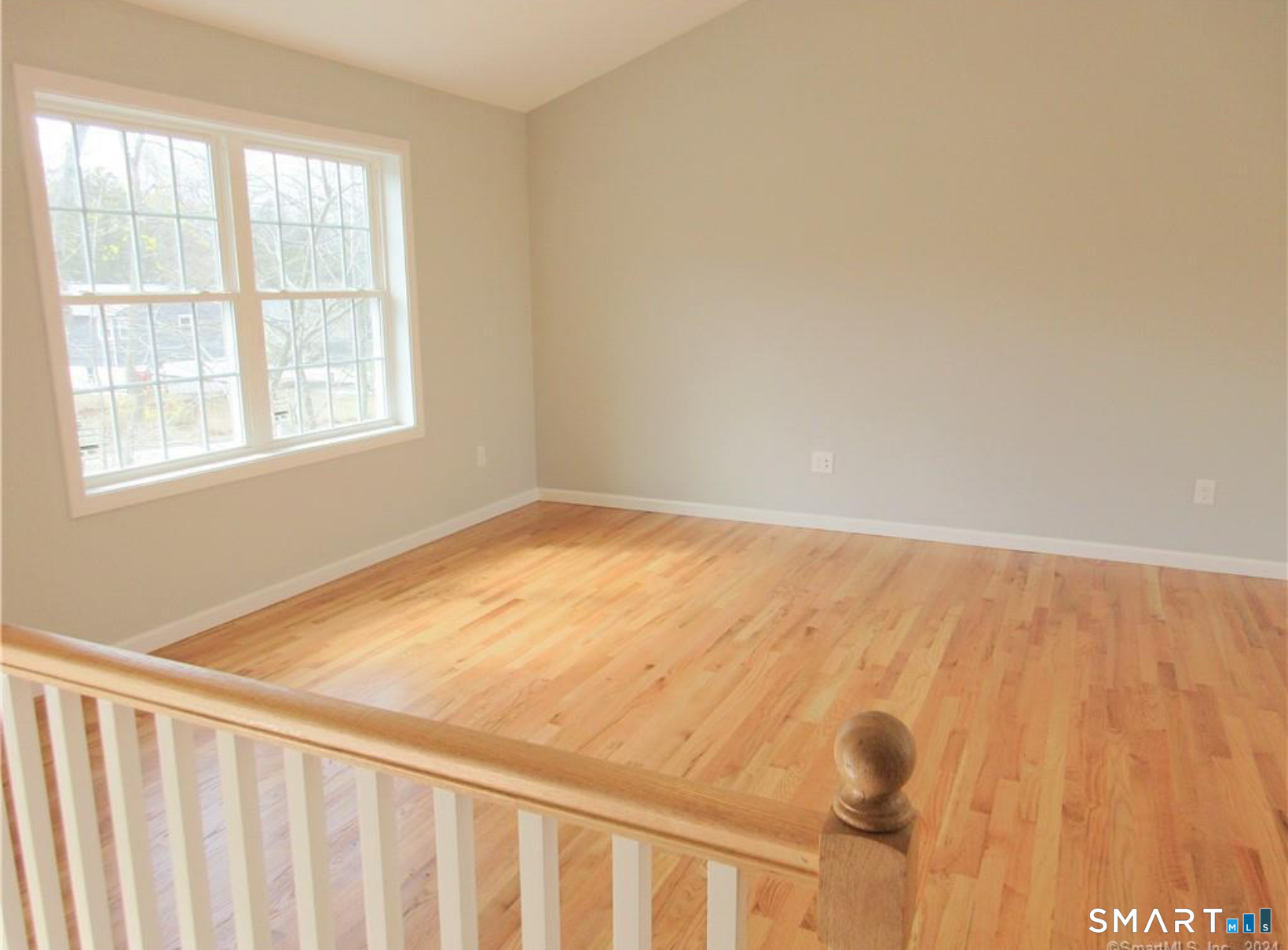 249 South Canterbury Road Canterbury, CT 06331 - Photo 4 of 20 a view of an empty room with a window