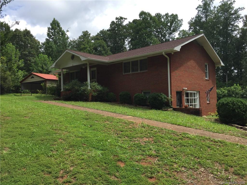 1920 Rock Road Rutherfordton, NC 28139 - Photo 1 of 48 a view of a back yard of the house