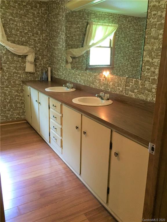 1920 Rock Road Rutherfordton, NC 28139 - Photo 11 of 48 a bathroom with a sink and a mirror