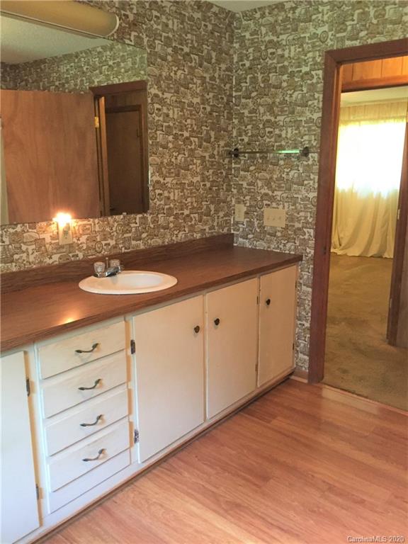 1920 Rock Road Rutherfordton, NC 28139 - Photo 13 of 48 a bathroom with a sink and a mirror