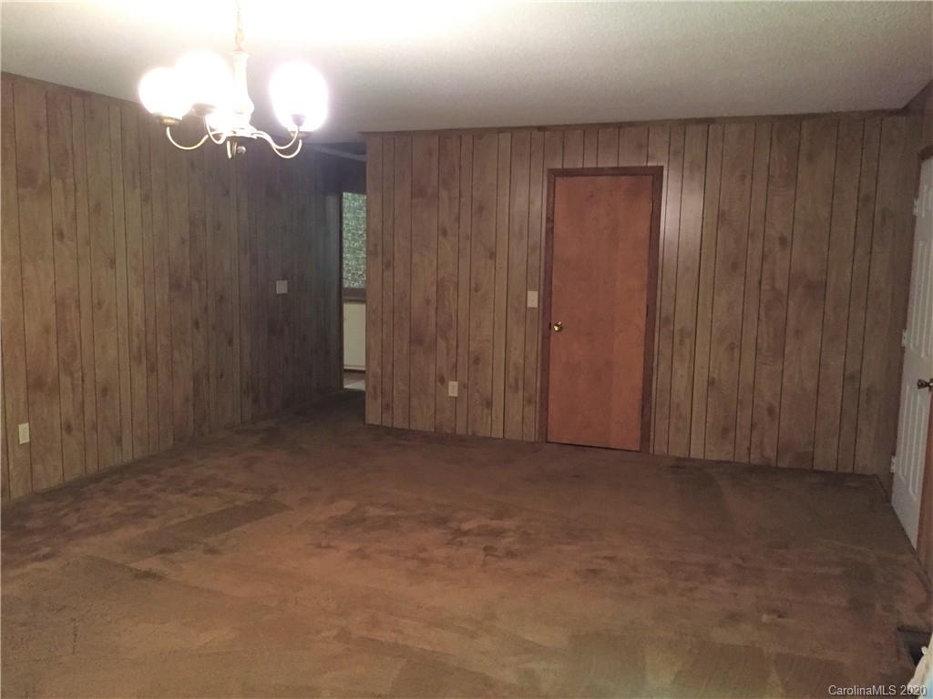 1920 Rock Road Rutherfordton, NC 28139 - Photo 3 of 48 a view of a chandelier in an empty room