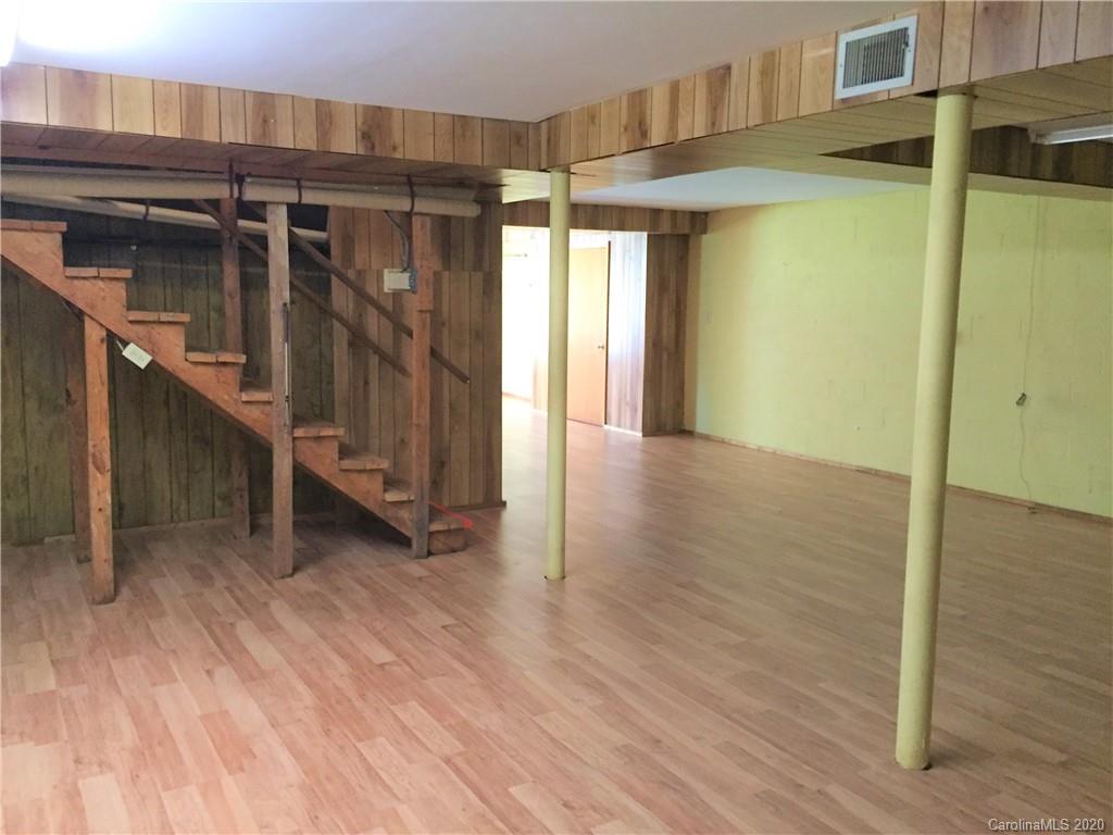 1920 Rock Road Rutherfordton, NC 28139 - Photo 22 of 48 a view of a room with wooden floor and windows