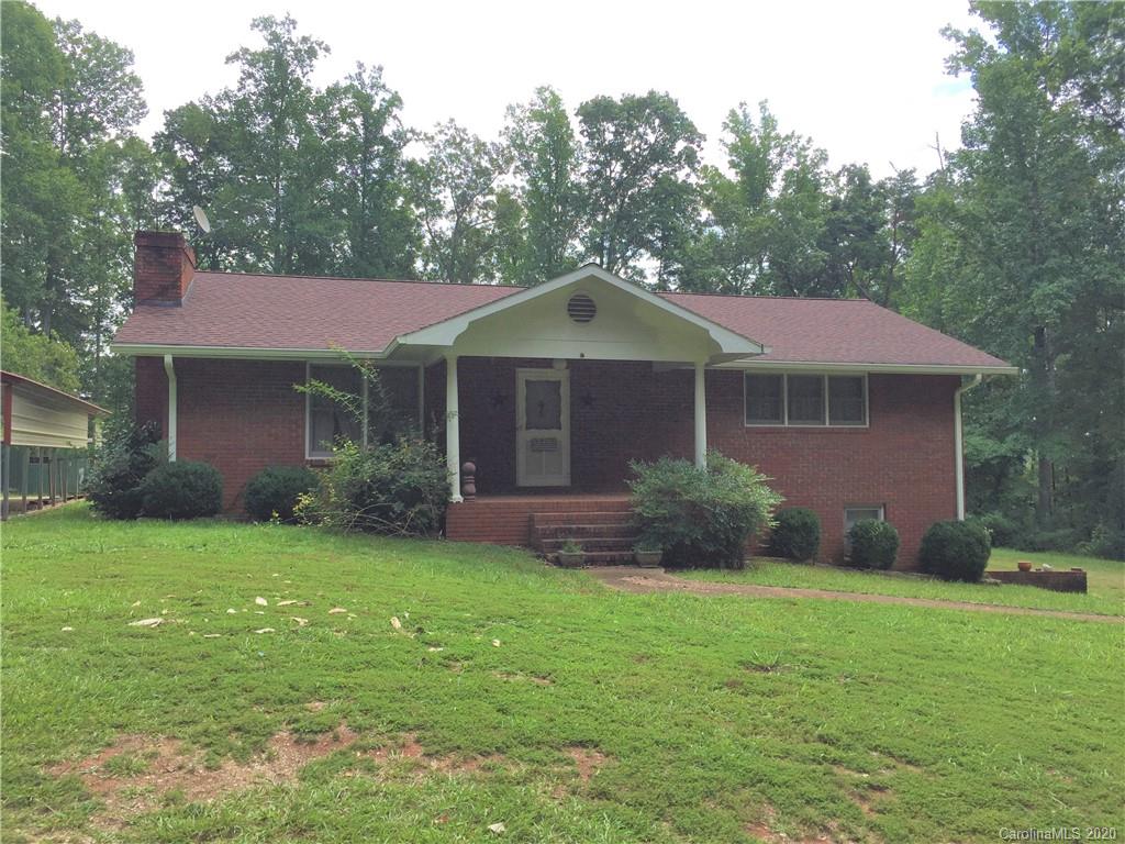 1920 Rock Road Rutherfordton, NC 28139 - Photo 31 of 48 a front view of a house with a garden