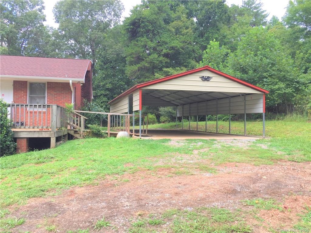 1920 Rock Road Rutherfordton, NC 28139 - Photo 33 of 48 a backyard of a house with table and chairs