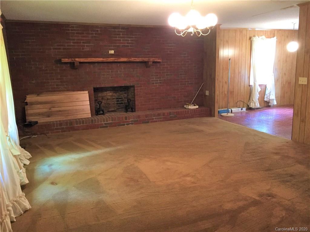 1920 Rock Road Rutherfordton, NC 28139 - Photo 5 of 48 a view of empty room with a fireplace