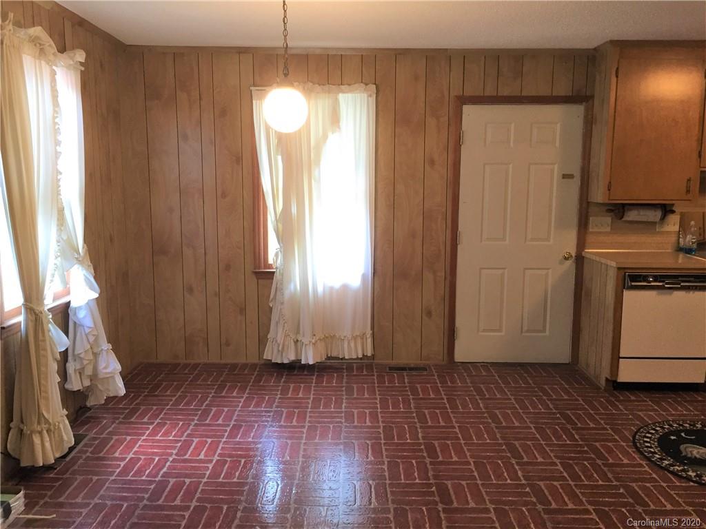 1920 Rock Road Rutherfordton, NC 28139 - Photo 6 of 48 a view of empty room with windows