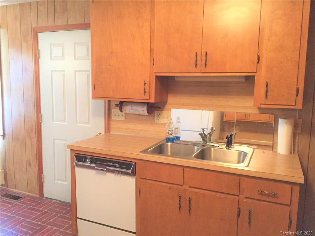 1920 Rock Road Rutherfordton, NC 28139 - Photo 9 of 48 a kitchen with a sink and cabinets