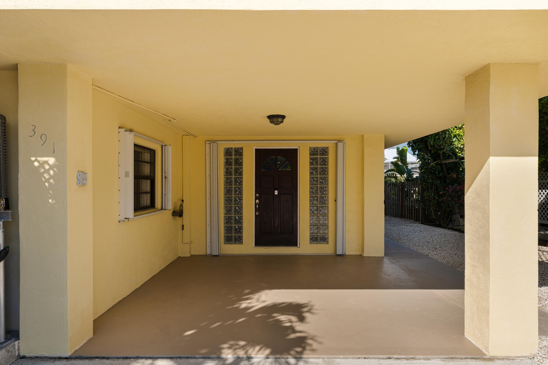 391 10th Street Key Colony Beach, FL 33051 - Photo 11 of 51 a view of a hallway with wooden floor and closet