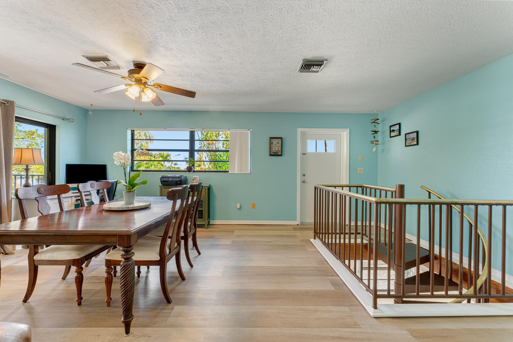 391 10th Street Key Colony Beach, FL 33051 - Photo 14 of 51 a view of a a dining room with furniture window and wooden floor