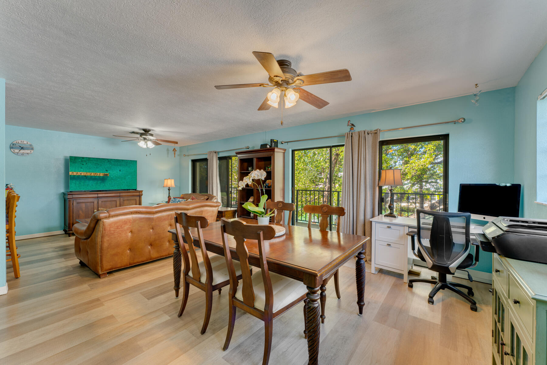 391 10th Street Key Colony Beach, FL 33051 - Photo 15 of 51 a view of a dining room with furniture window and wooden floor
