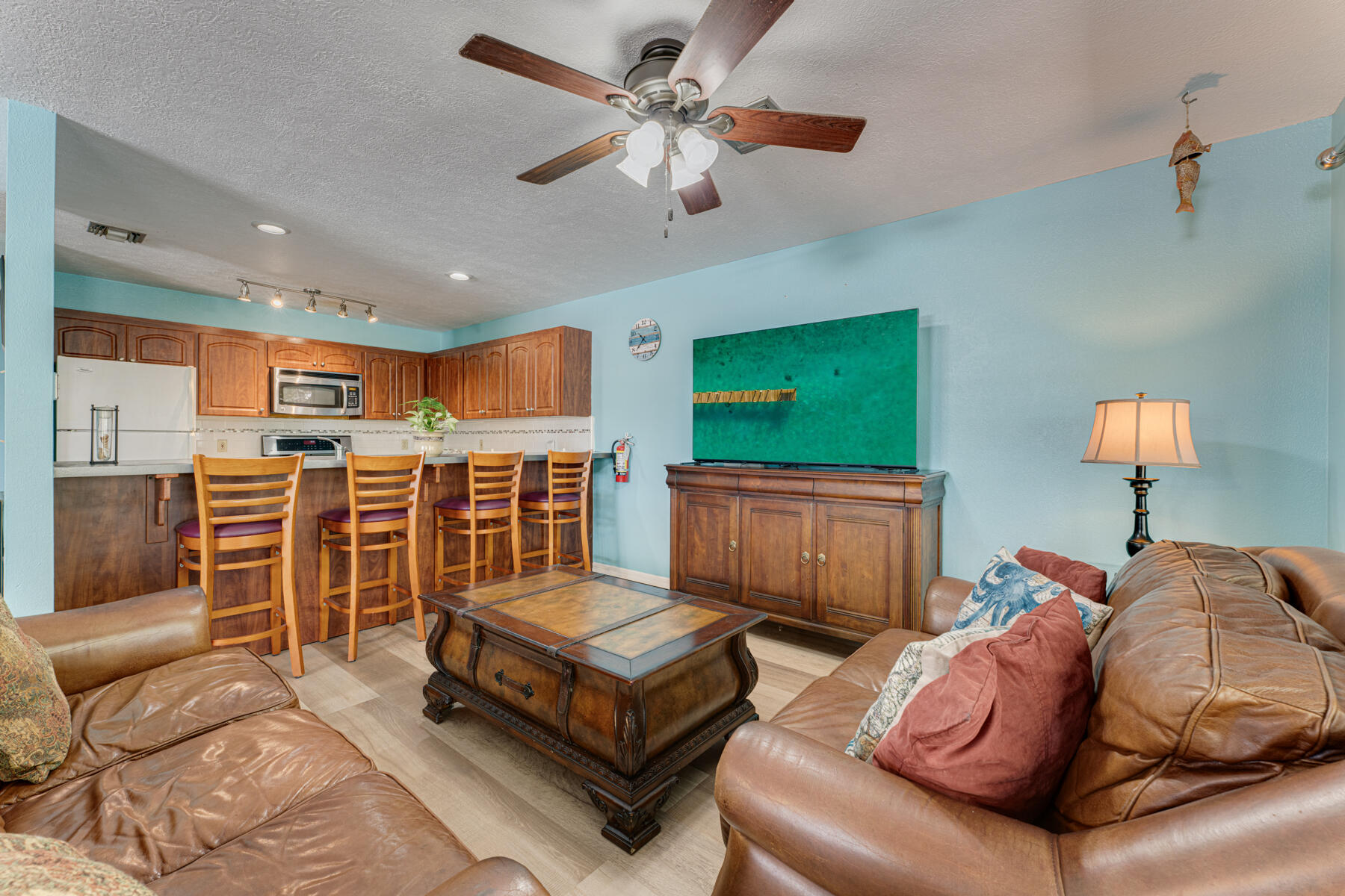 391 10th Street Key Colony Beach, FL 33051 - Photo 19 of 51 a living room with furniture and a flat screen tv