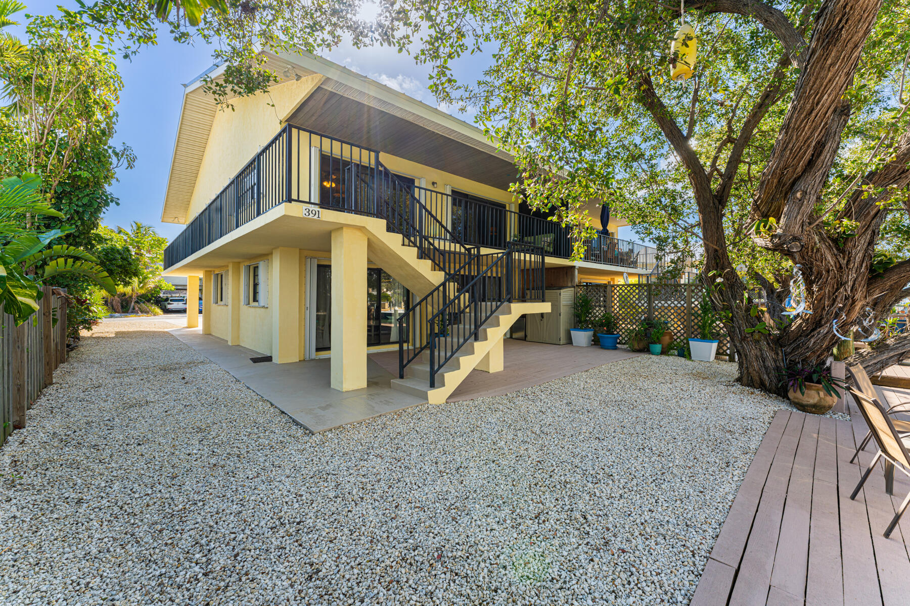 391 10th Street Key Colony Beach, FL 33051 - Photo 41 of 51 a view of a house with a yard