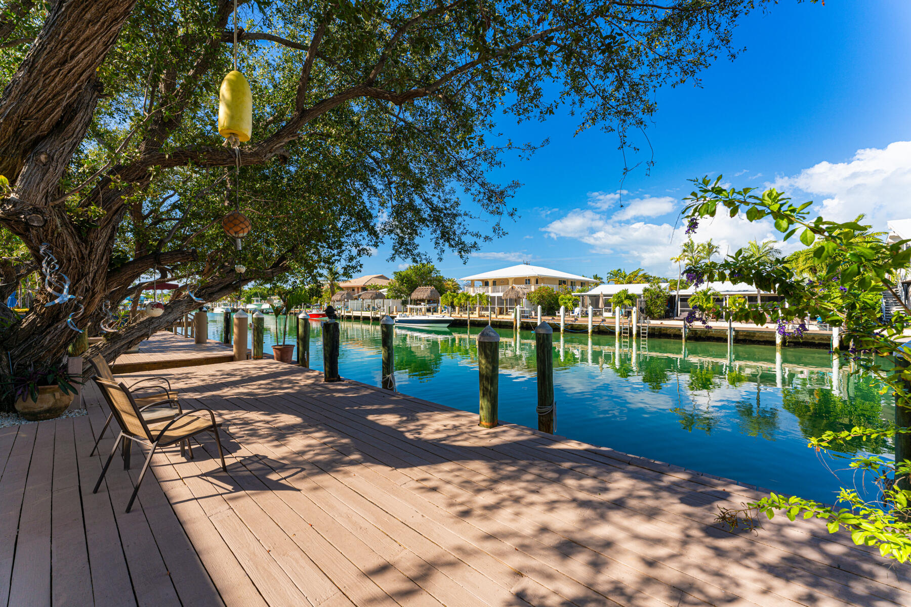 391 10th Street Key Colony Beach, FL 33051 - Photo 43 of 51 a view of a backyard with a lake view