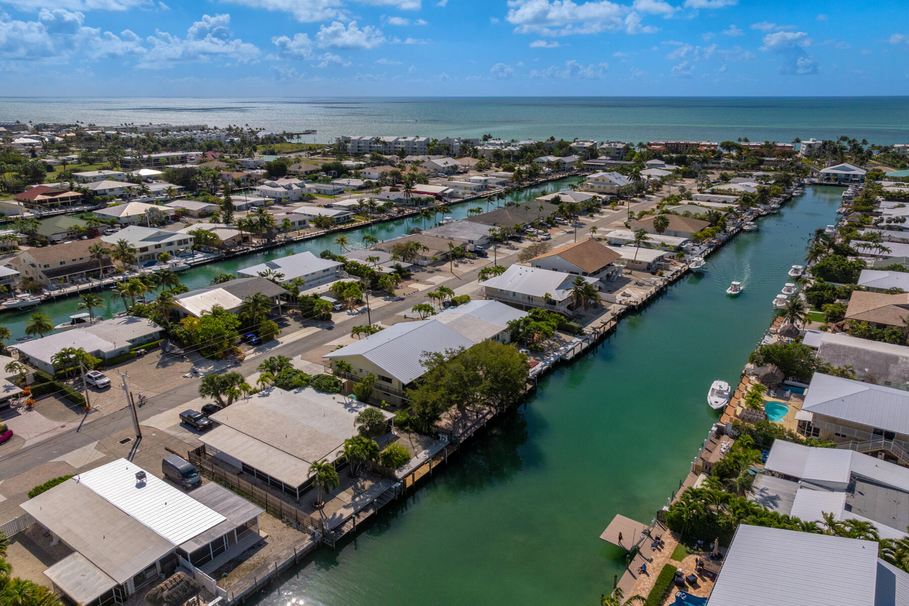 391 10th Street Key Colony Beach, FL 33051 - Photo 48 of 51 an aerial view of a city with ocean view
