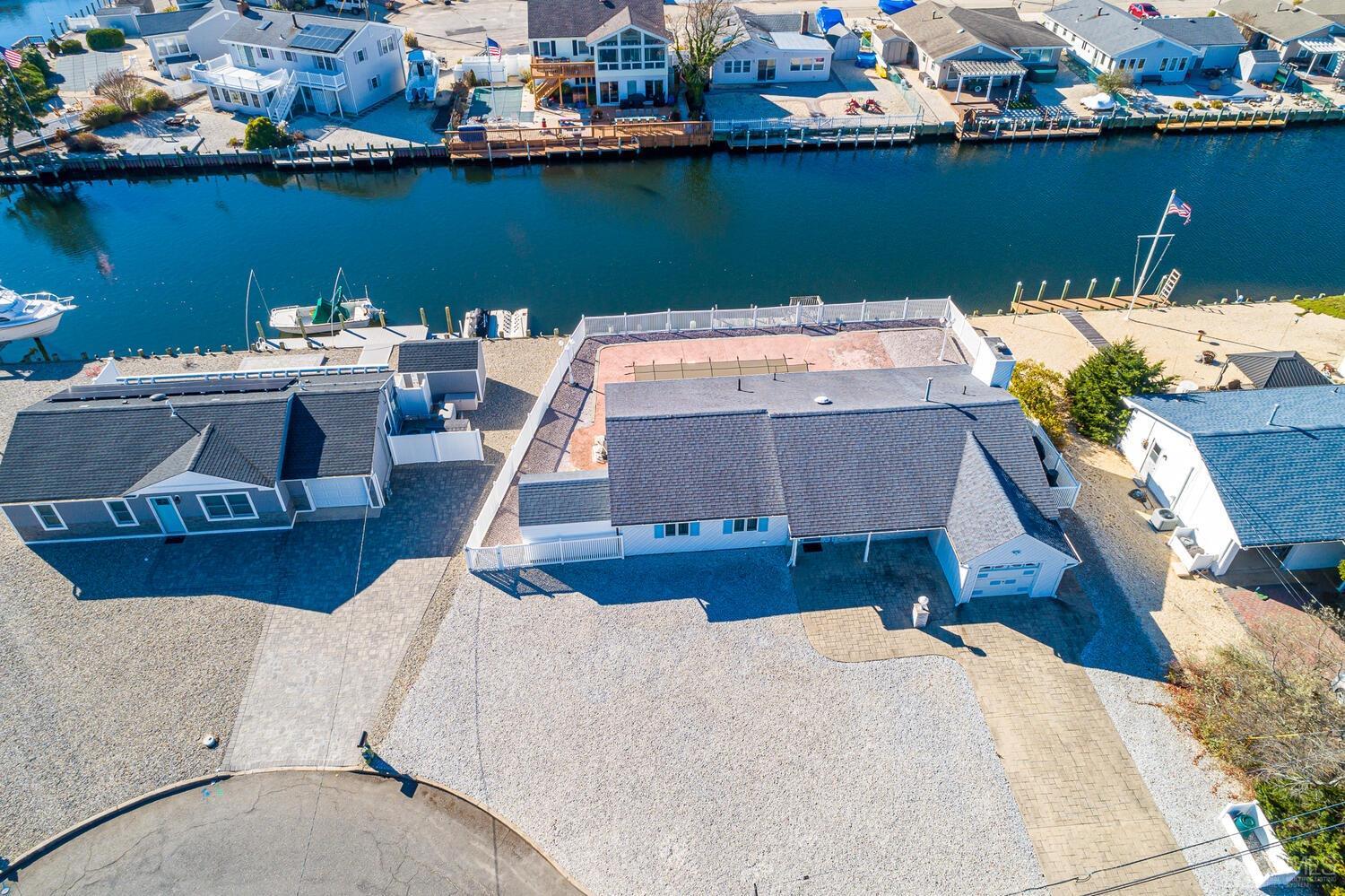 205 Biscayne Road Barnegat, NJ 08005 - Photo 8 of 49 an aerial view of a house with a lake view