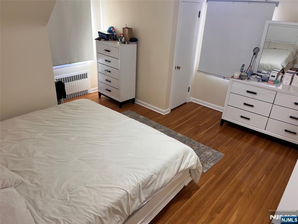 500 Weart Avenue, Unit 2 Lyndhurst, NJ 07071 - Photo 19 of 20 a bedroom with a bed and furniture
