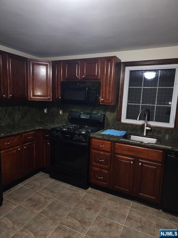 500 Weart Avenue, Unit 2 Lyndhurst, NJ 07071 - Photo 6 of 20 a kitchen with a sink and a stove