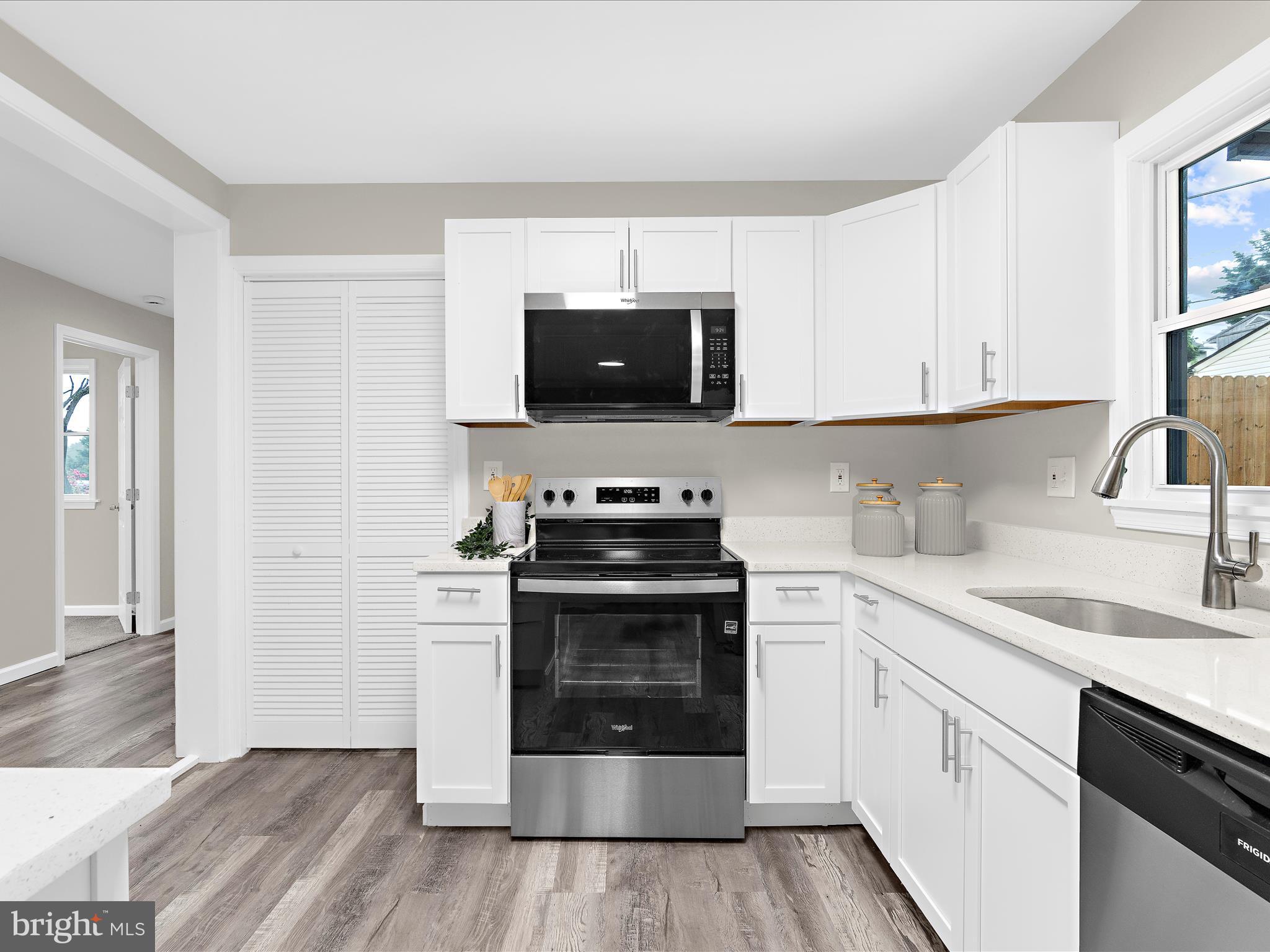 813 Ferguson Road Joppa, MD 21085 - Photo 15 of 39 a kitchen with a stove and a sink