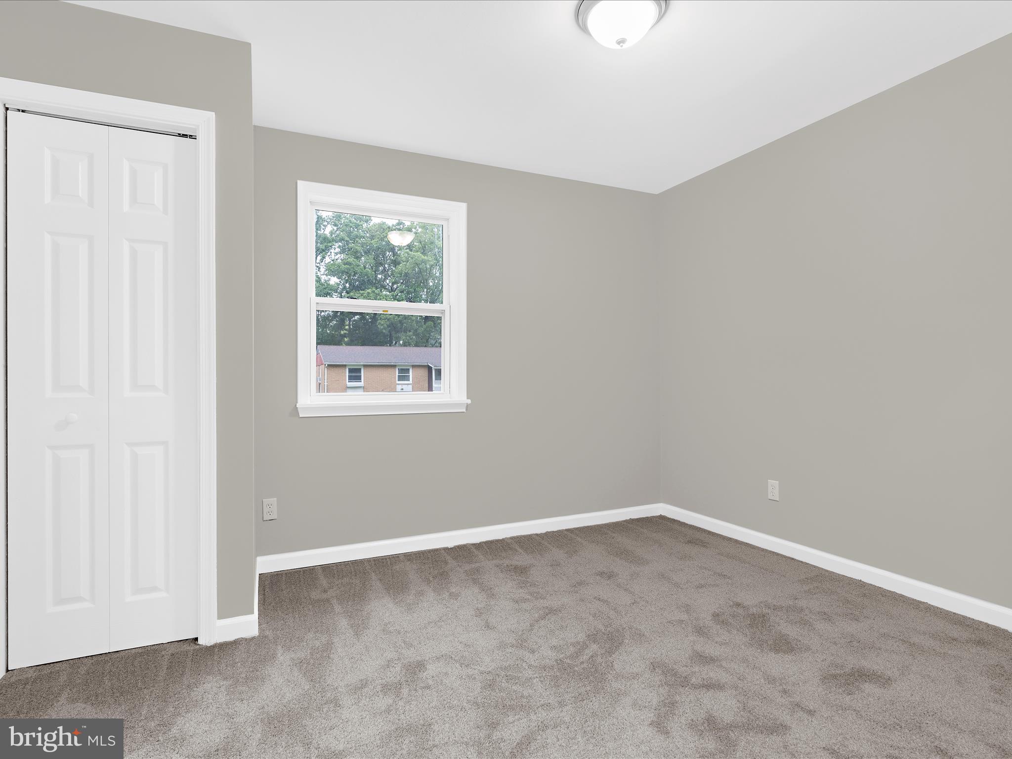 813 Ferguson Road Joppa, MD 21085 - Photo 18 of 39 an empty room with a window