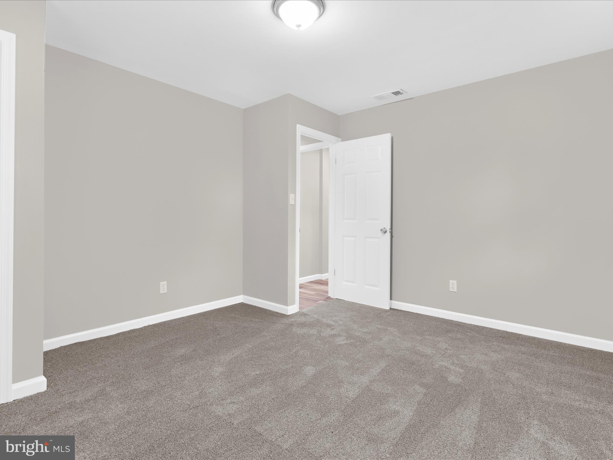813 Ferguson Road Joppa, MD 21085 - Photo 21 of 39 a view of an empty room