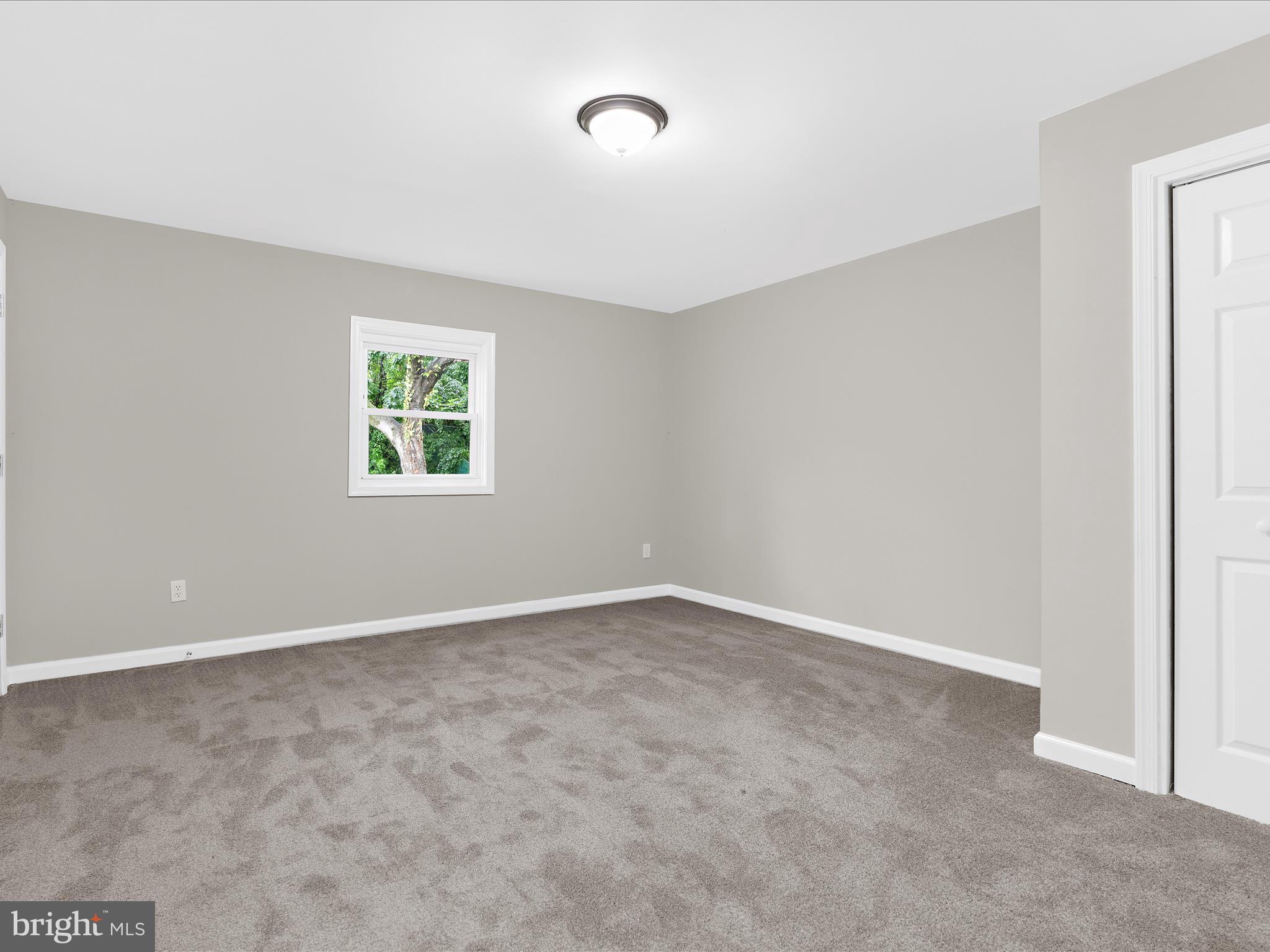 813 Ferguson Road Joppa, MD 21085 - Photo 24 of 39 an empty room with windows