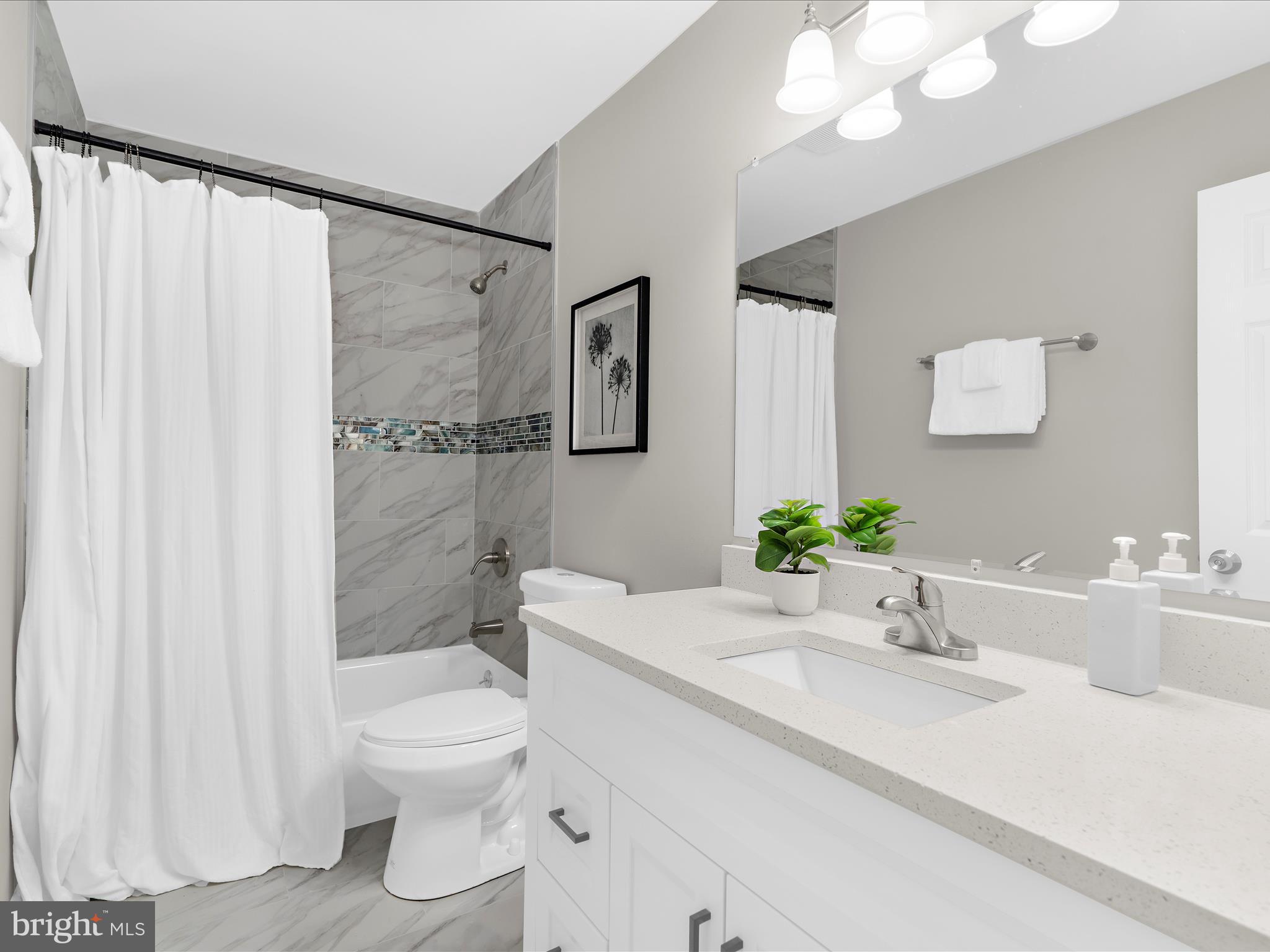 813 Ferguson Road Joppa, MD 21085 - Photo 26 of 39 a bathroom with a sink toilet and shower