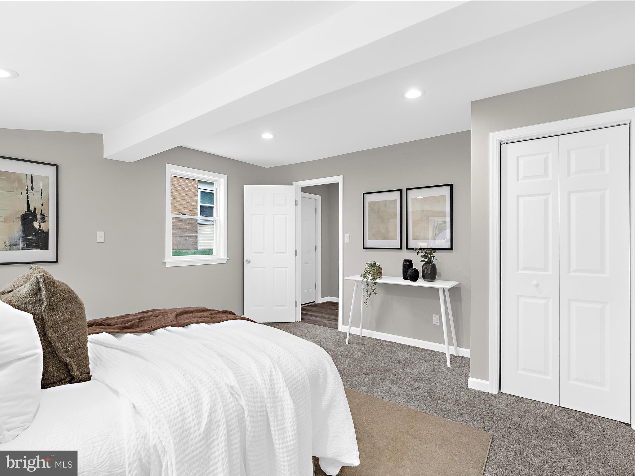 813 Ferguson Road Joppa, MD 21085 - Photo 29 of 39 a bedroom with a bed and a couch