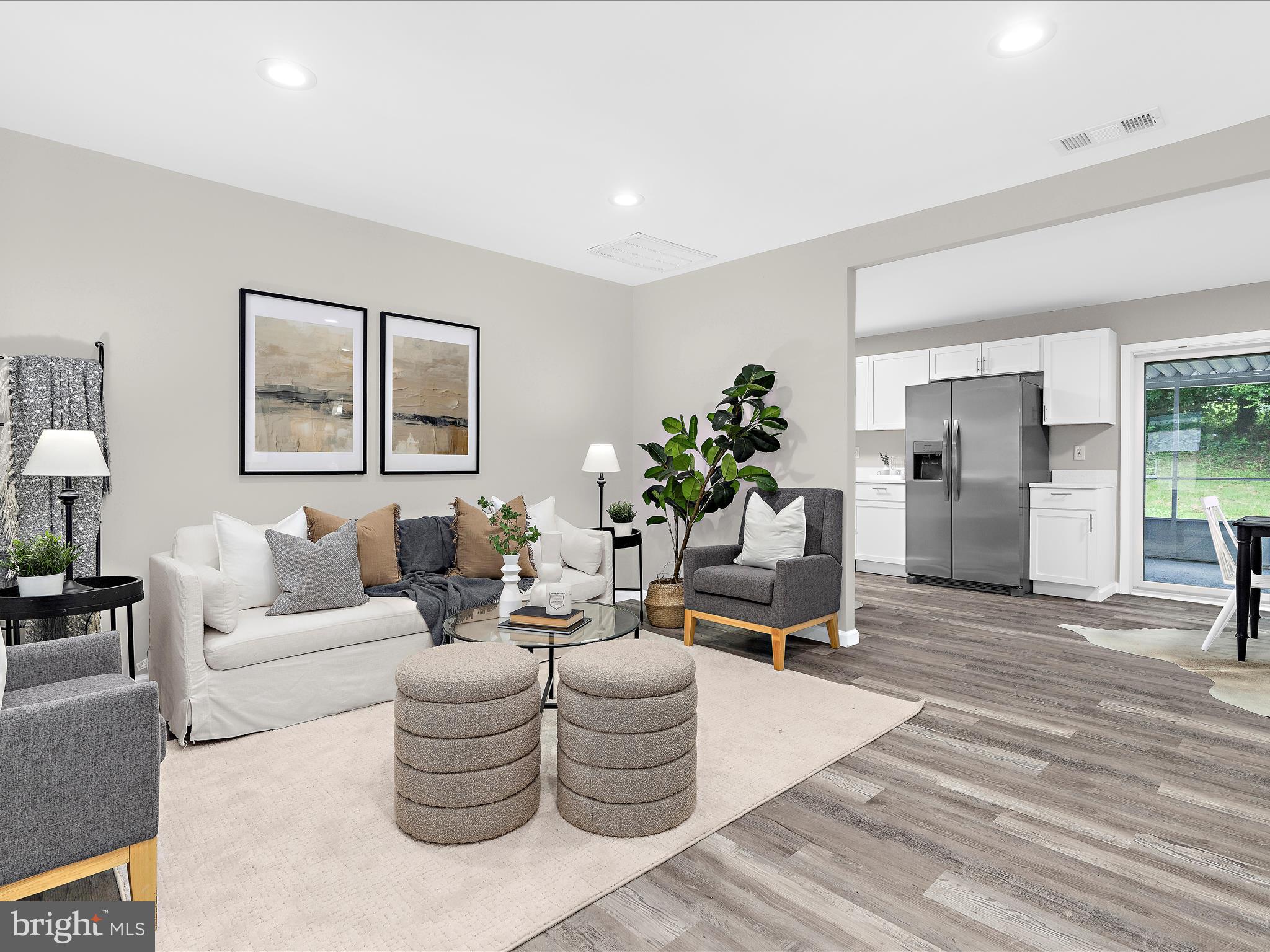 813 Ferguson Road Joppa, MD 21085 - Photo 8 of 39 a living room with furniture and wooden floor