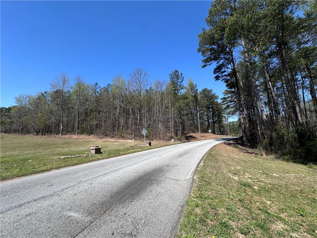 1435 Rogers Lake Road Lithonia, GA 30058 - Photo 4 of 9 a view of a yard with a large trees