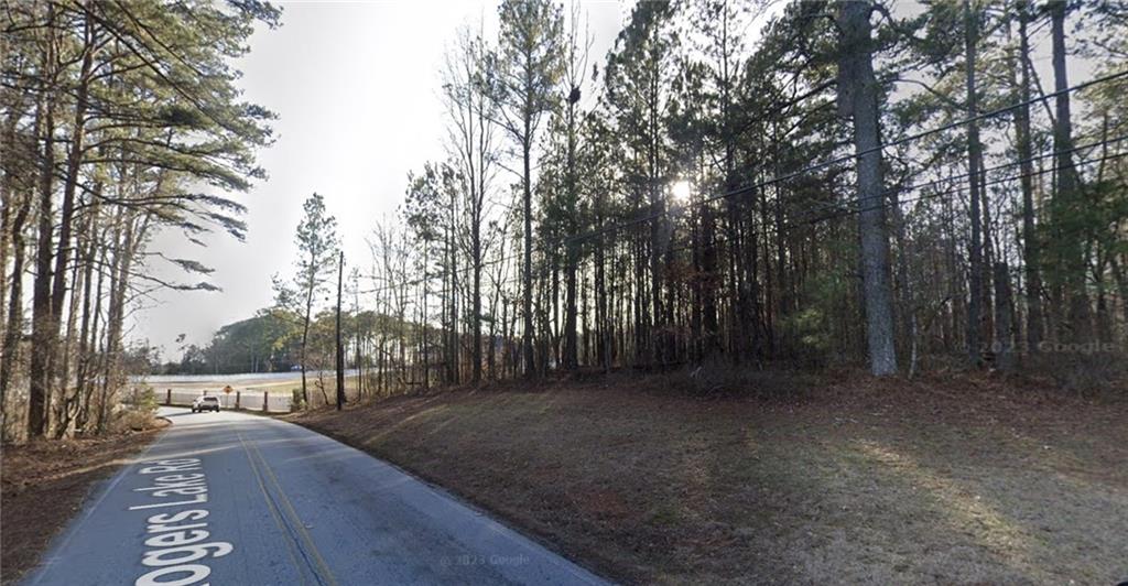 1435 Rogers Lake Road Lithonia, GA 30058 - Photo 5 of 9 a view of a forest with trees