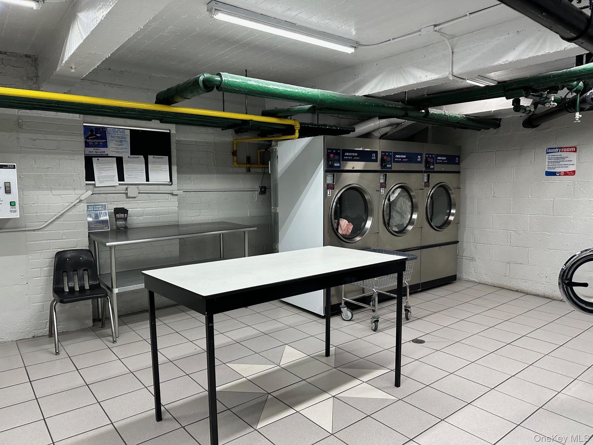 112-25 34th Avenue, Unit G Queens, NY 11368 - Photo 33 of 47 a utility room with dryer and washer