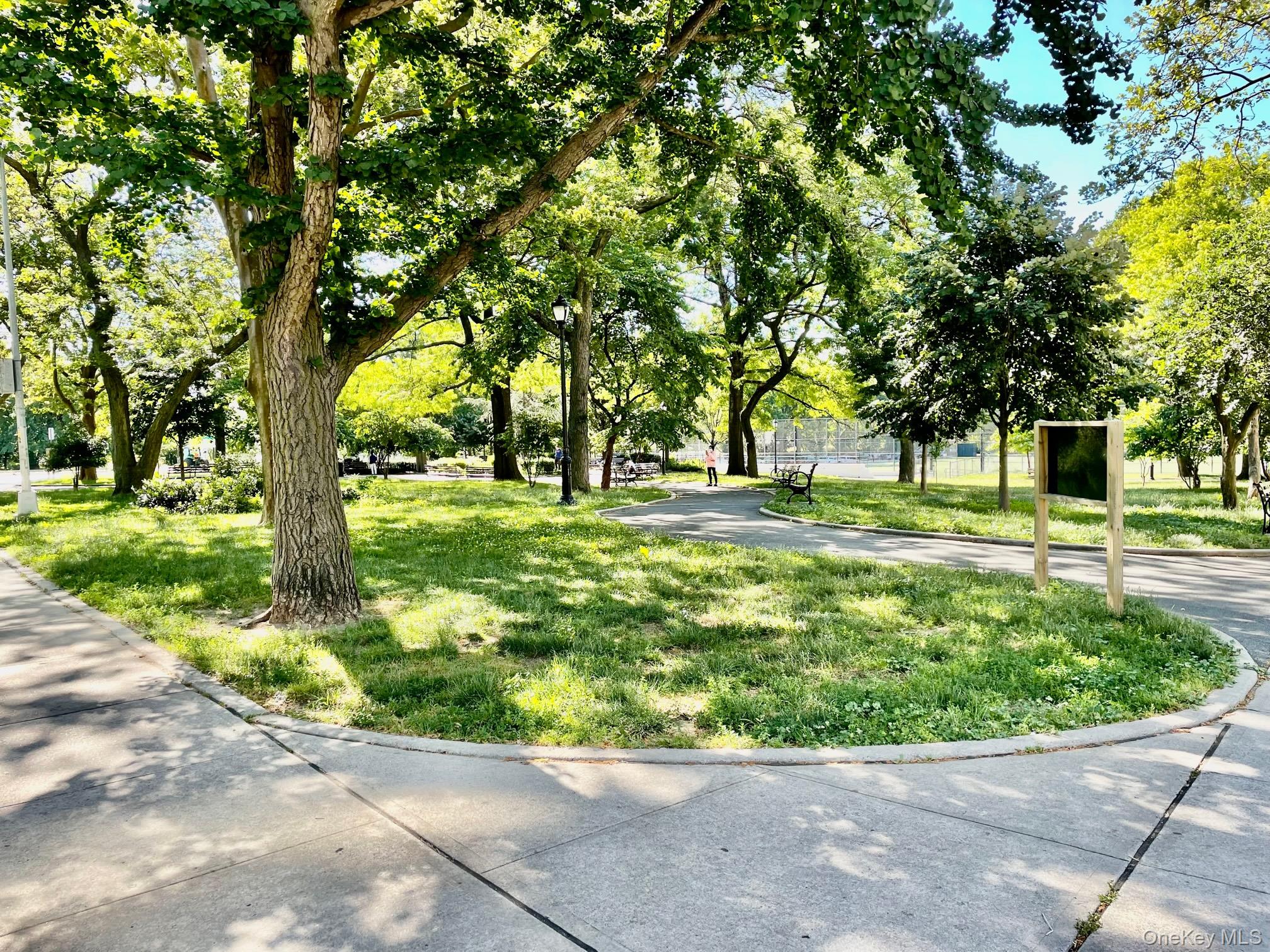 112-25 34th Avenue, Unit G Queens, NY 11368 - Photo 42 of 47 a garden view with a fountain