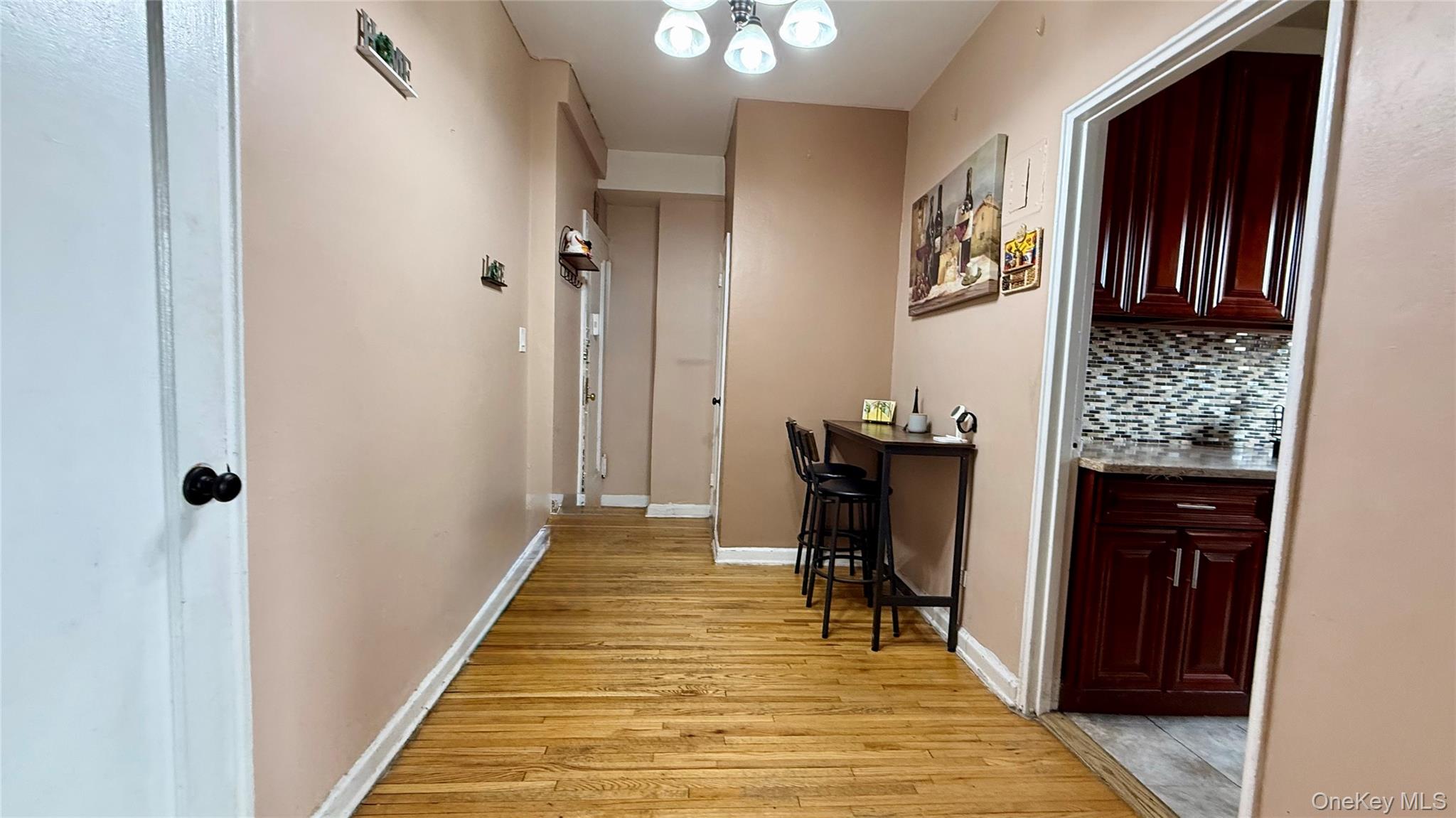 112-25 34th Avenue, Unit G Queens, NY 11368 - Photo 6 of 47 a view of a hallway with seating area
