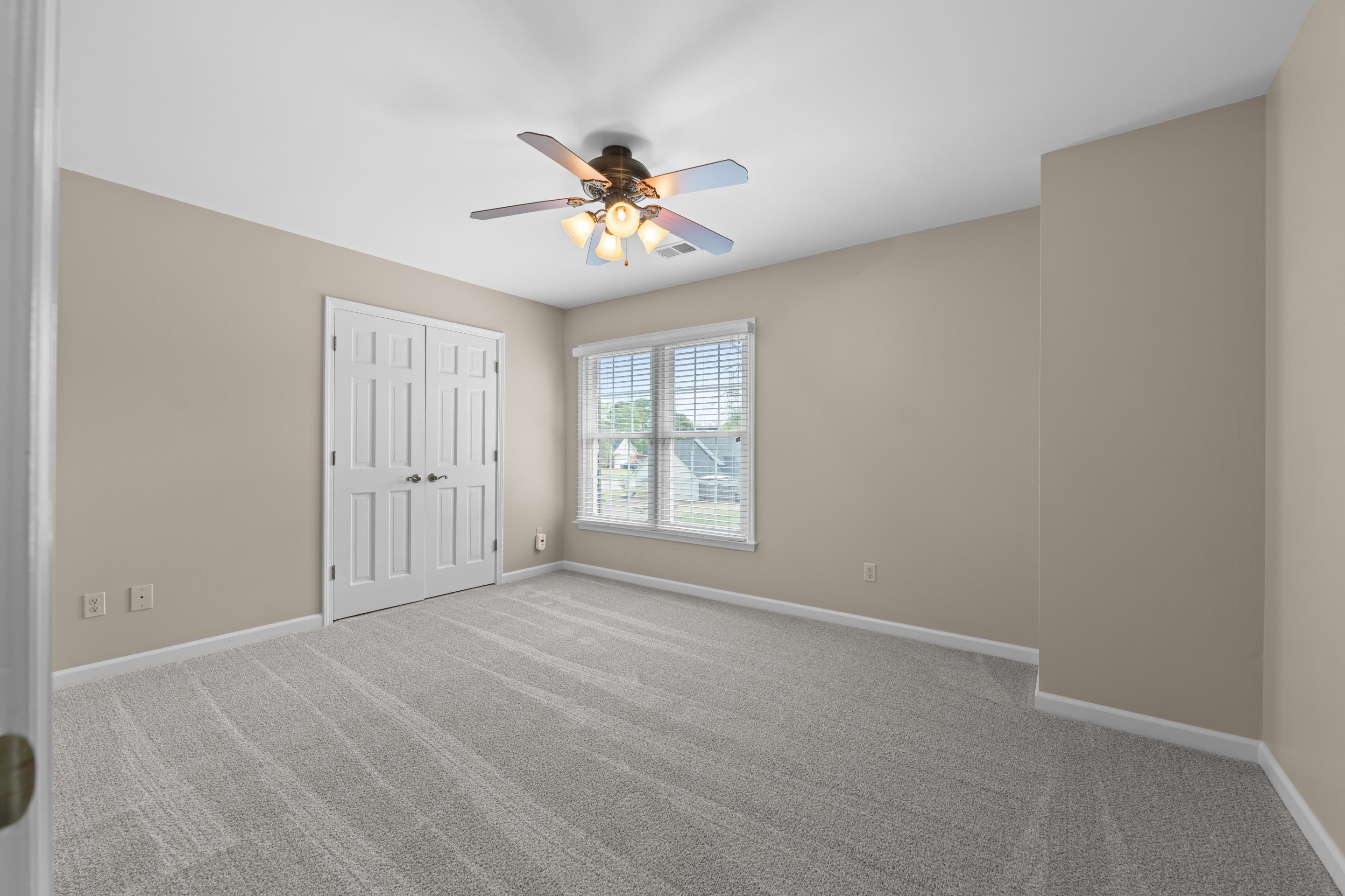 677 Gunnison Cove Collierville, TN 38017 - Photo 17 of 30 a view of an empty room with a window