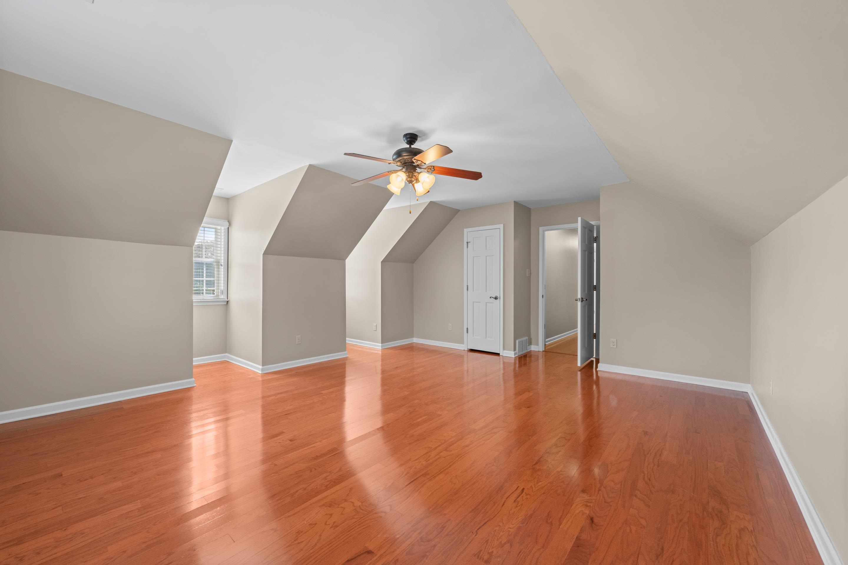 677 Gunnison Cove Collierville, TN 38017 - Photo 21 of 30 a view of empty room with wooden floor