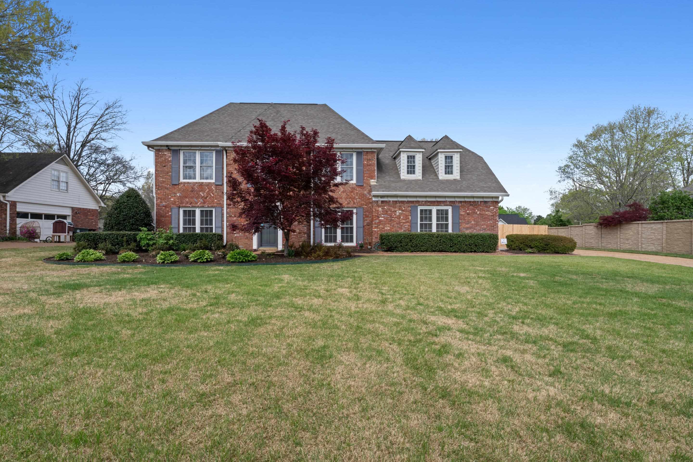 677 Gunnison Cove Collierville, TN 38017 - Photo 27 of 30 a front view of a house with a yard