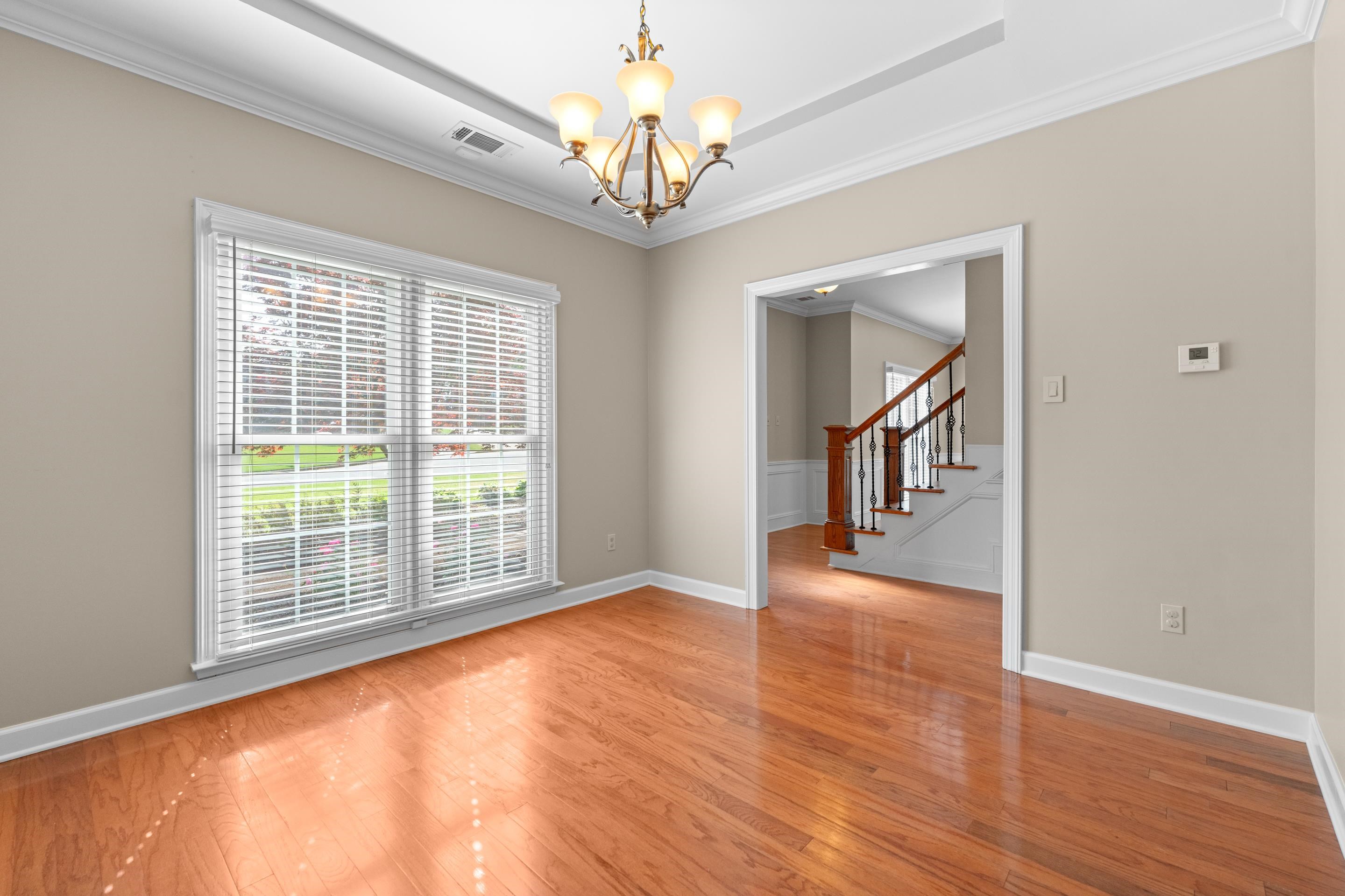 677 Gunnison Cove Collierville, TN 38017 - Photo 5 of 30 a view of livingroom with hardwood floor and window