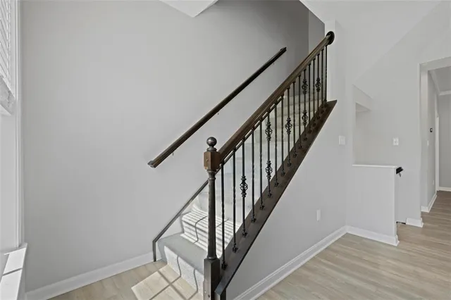 a view of entryway with wooden floor
