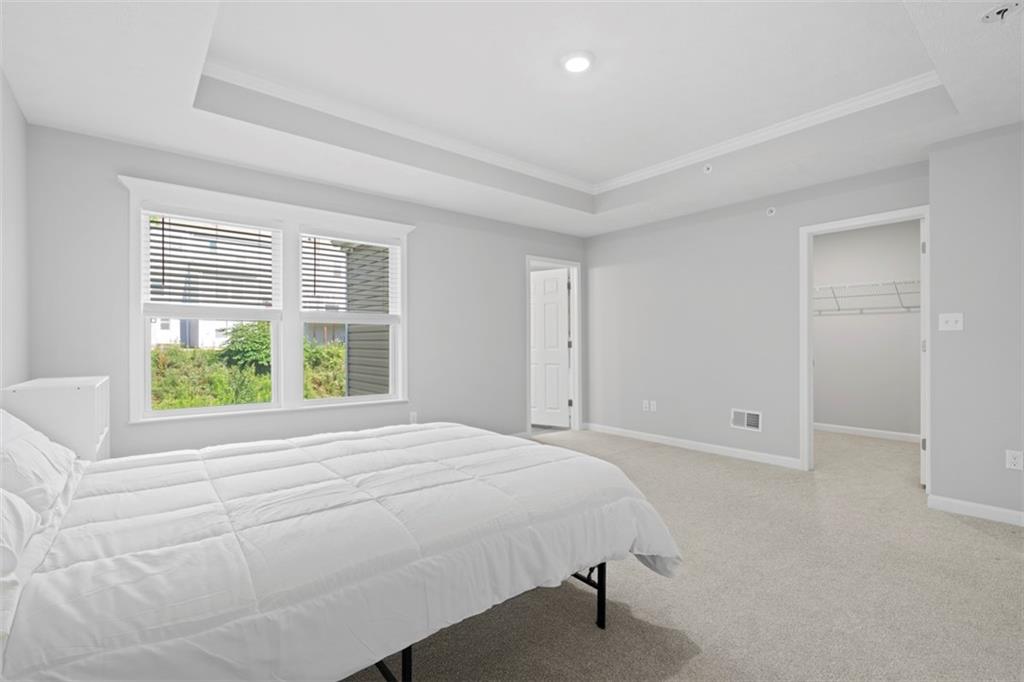 209 Lockheed Drive Coraopolis, PA 15108 - Photo 25 of 38 a bedroom with a bed and a large window