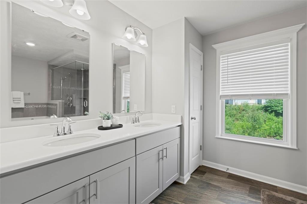 209 Lockheed Drive Coraopolis, PA 15108 - Photo 27 of 38 a bathroom with 2 sink and a large mirror