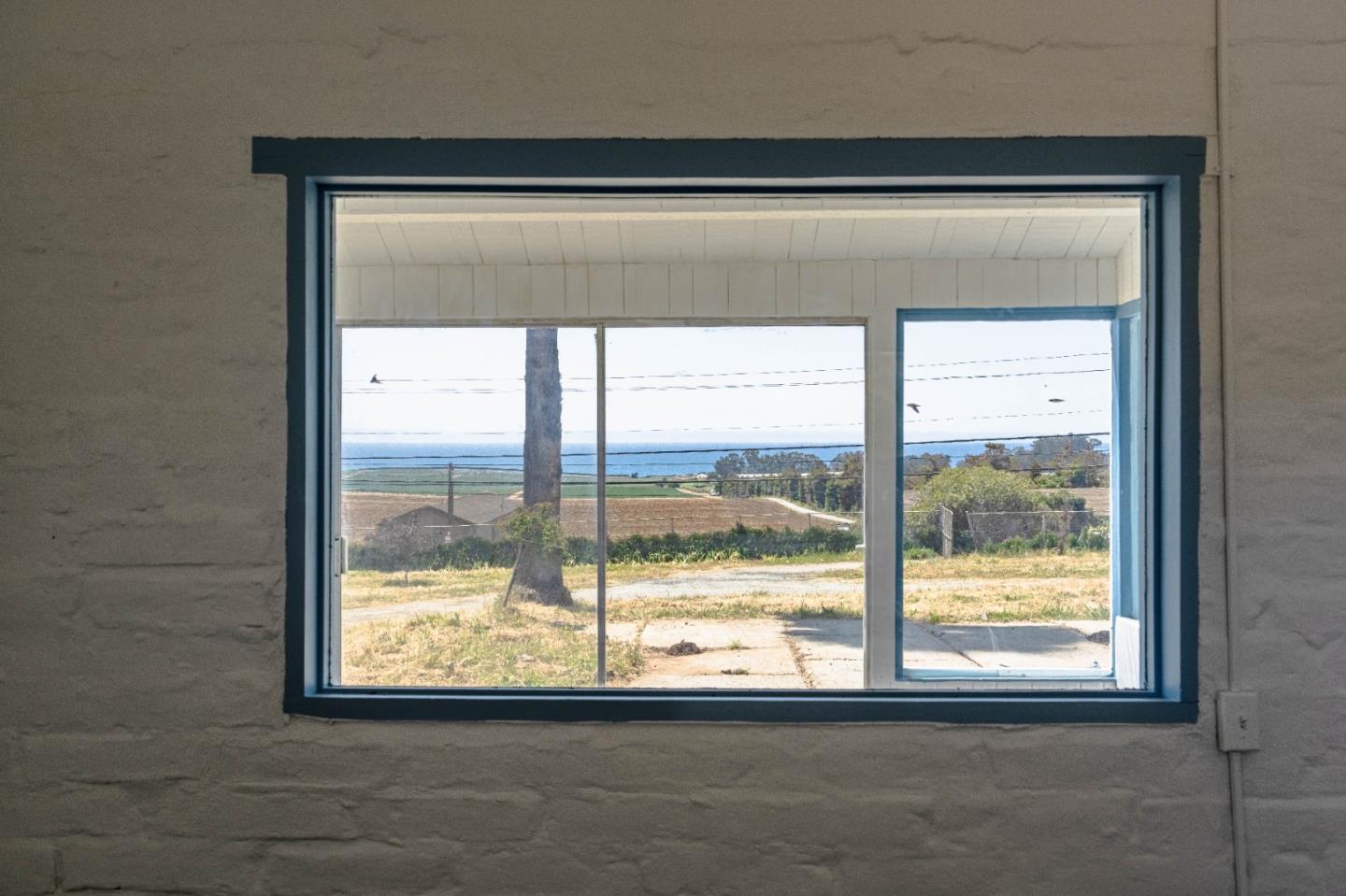 706 San Andreas Road Watsonville, CA 95076 - Photo 20 of 26 a view of an empty room with a window