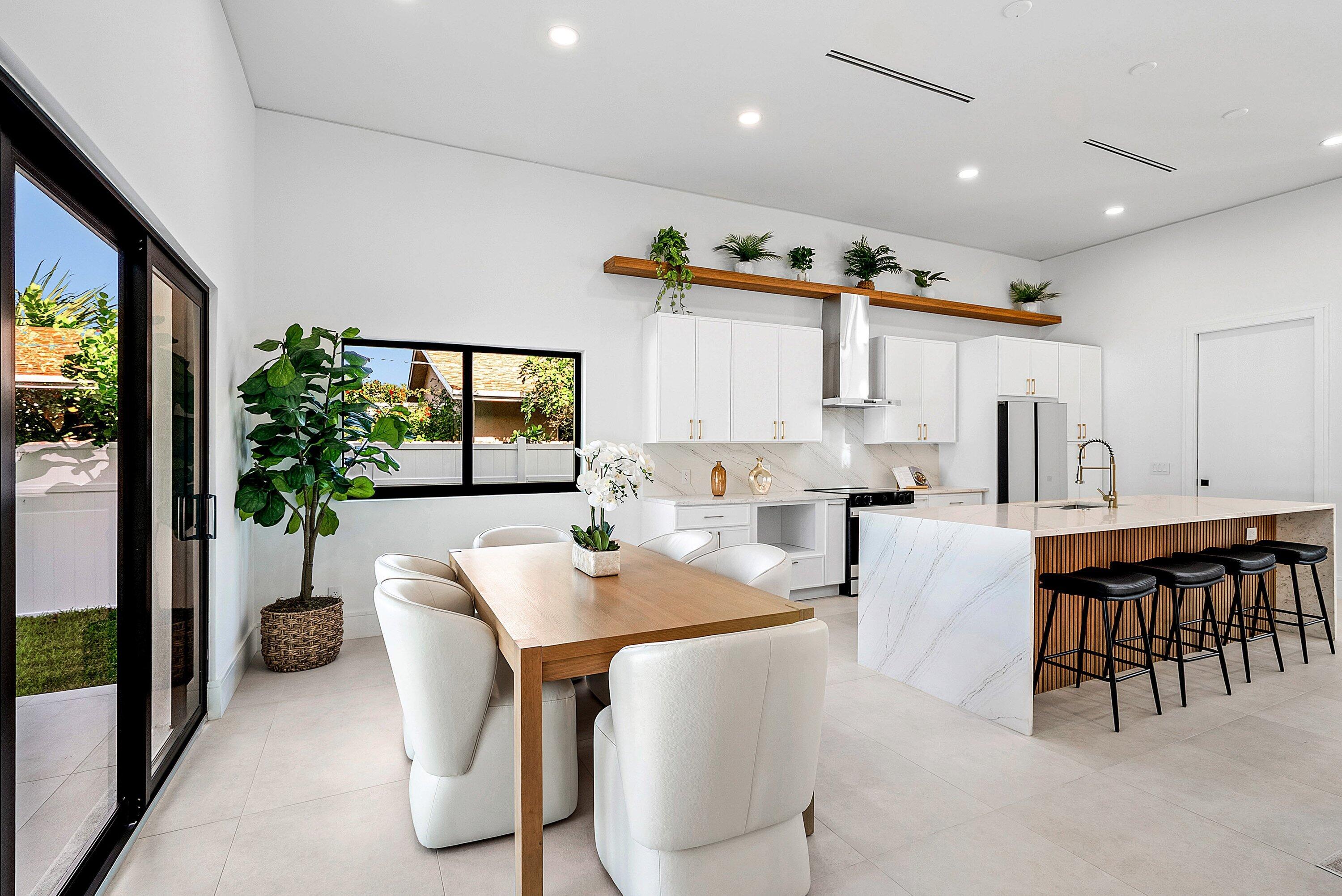 3361 Northeast 4th Avenue Boca Raton, FL 33431 - Photo 42 of 44 a view of kitchen with dining area